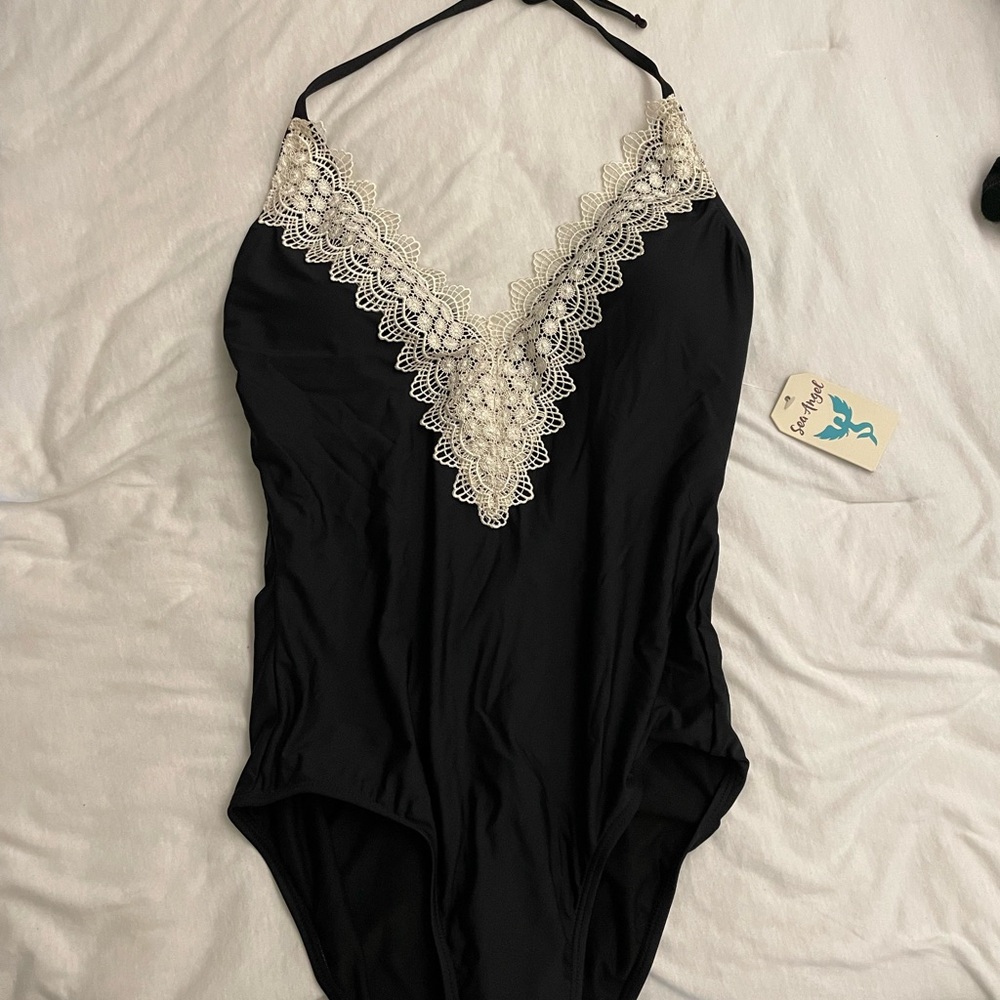 Black swimsuit with lace trim